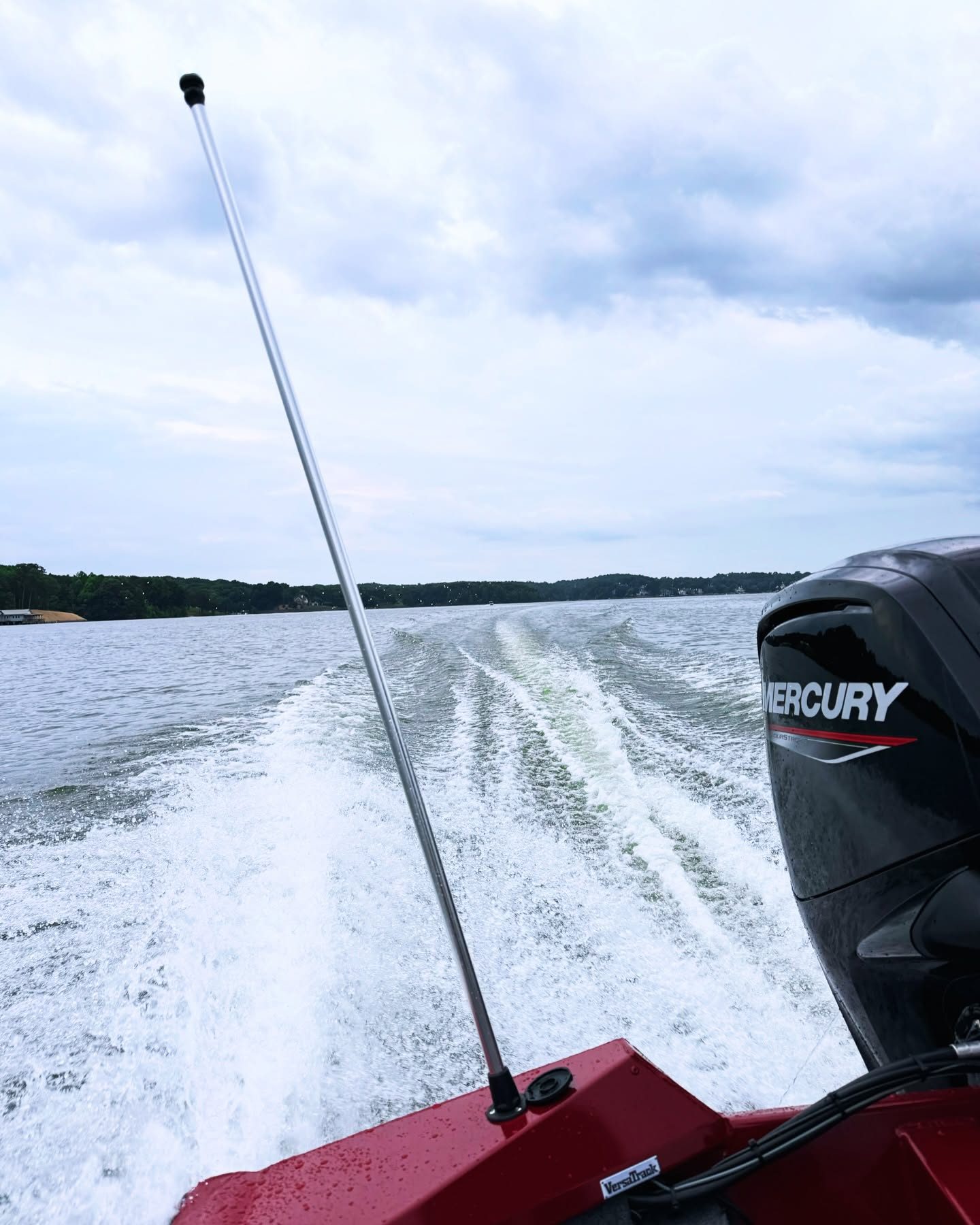 The Tracker 175's Mercury 75 cutting a wake across Lake Wylie