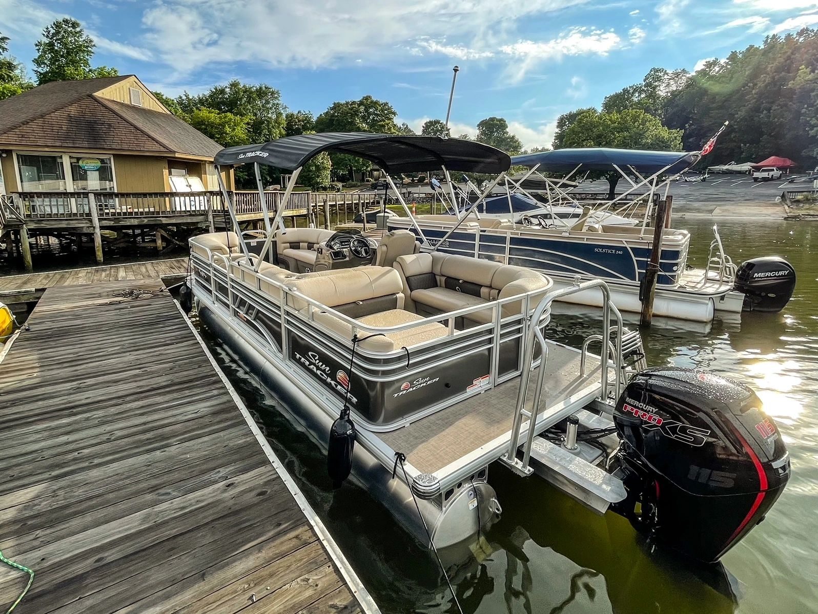Stern view of the pontoon showing the Mercury Pro-XS 115 outboard